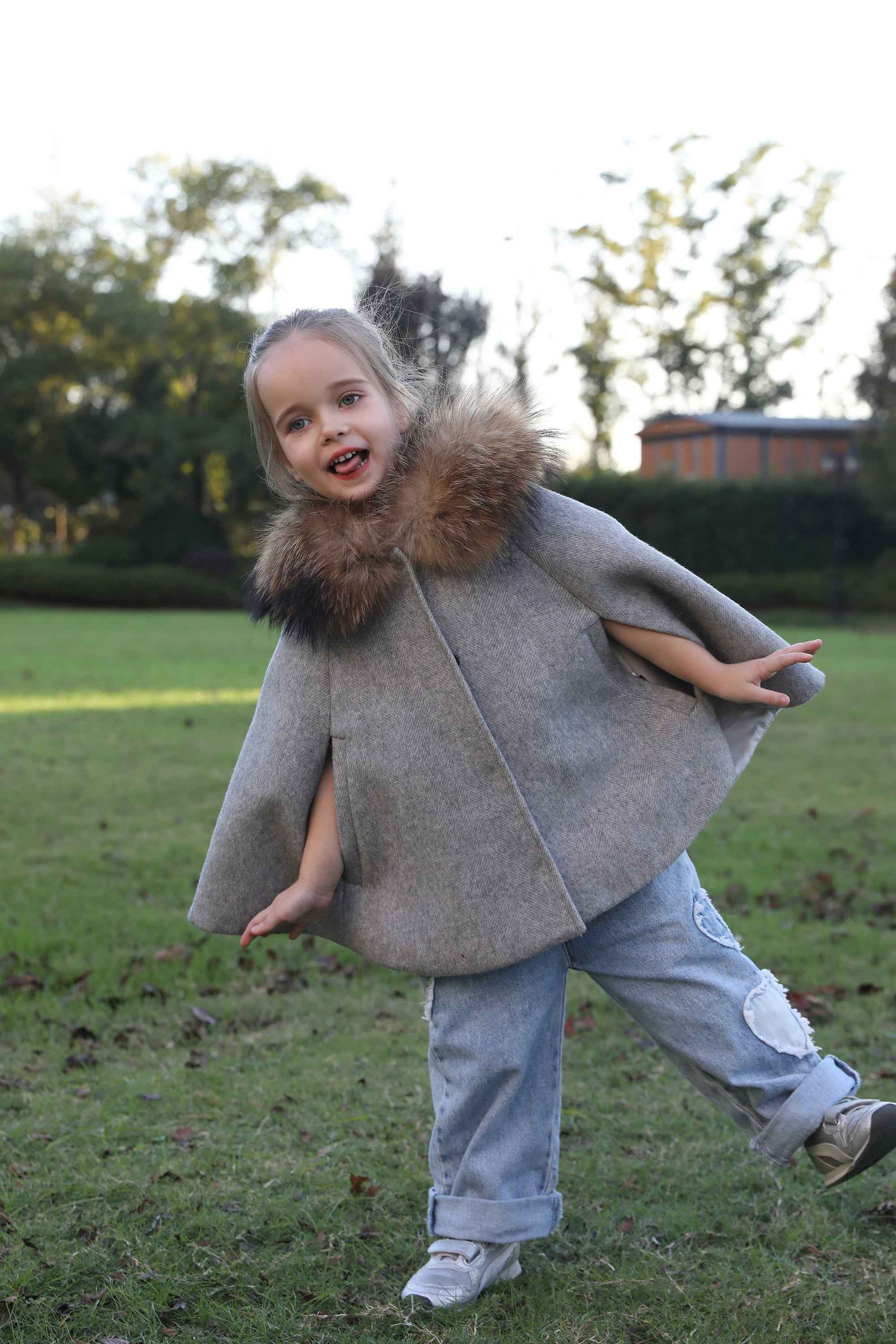 Raccoon fur trimmed children's cape