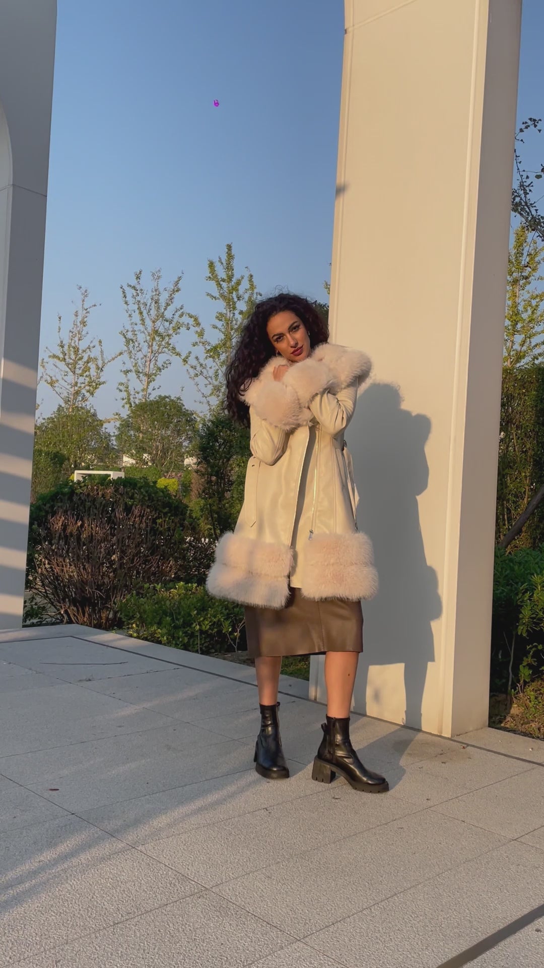 Eco-Friendly Leather Women's Mid-Length Coat with Faux Fur Cuffs and Belt