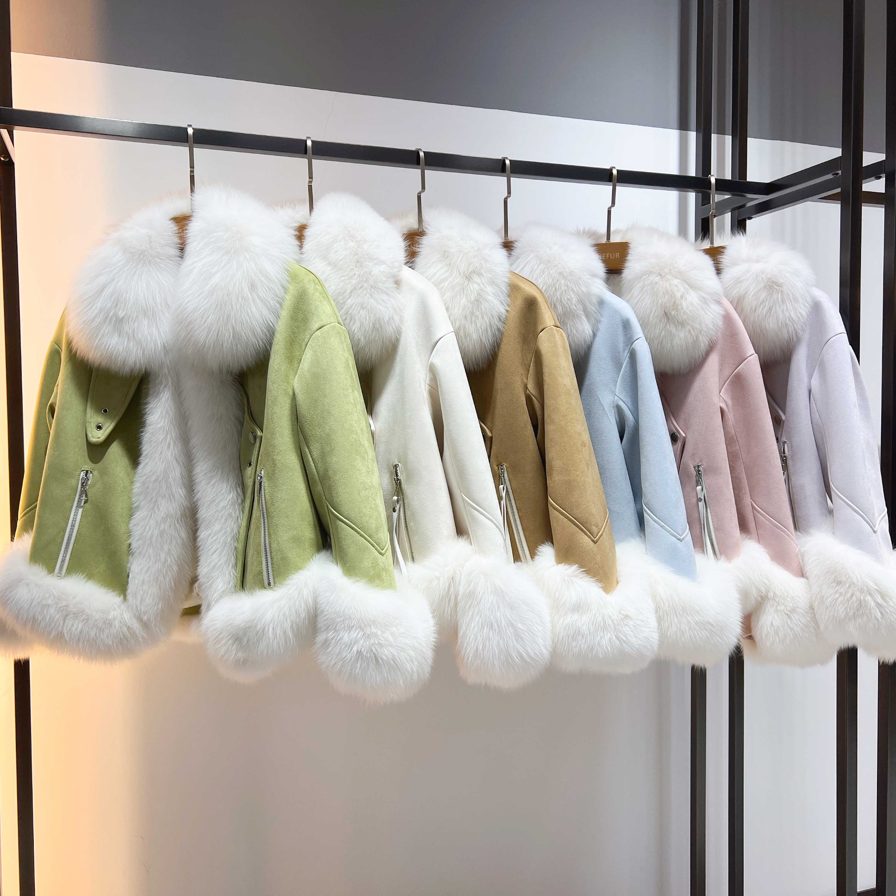 Colorful fox fur trim down jackets in pastel shades including mint green, ivory, champagne, powder blue, and blush pink