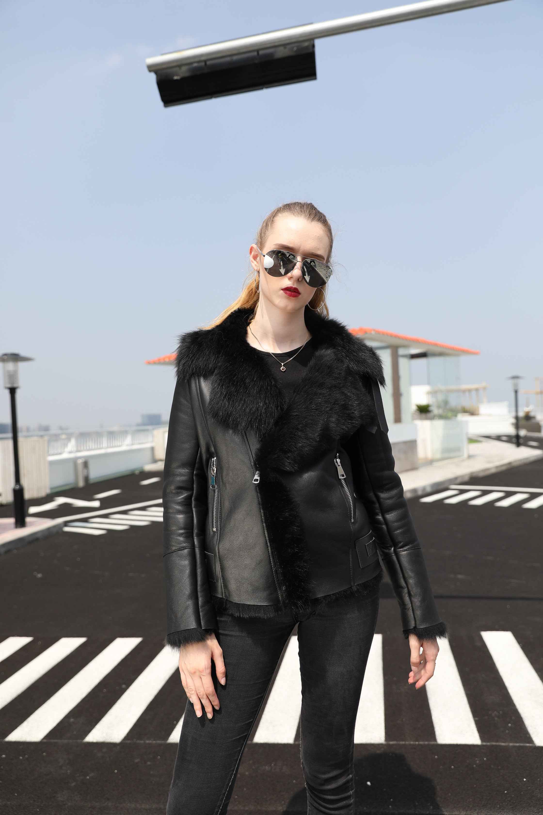 Women's Shearling Leather Jacket with Fur-Trimmed Collar & Cuffs, Zippered Cuffs, and Decorative Hem Buckles - Luxe Winter Outerwear