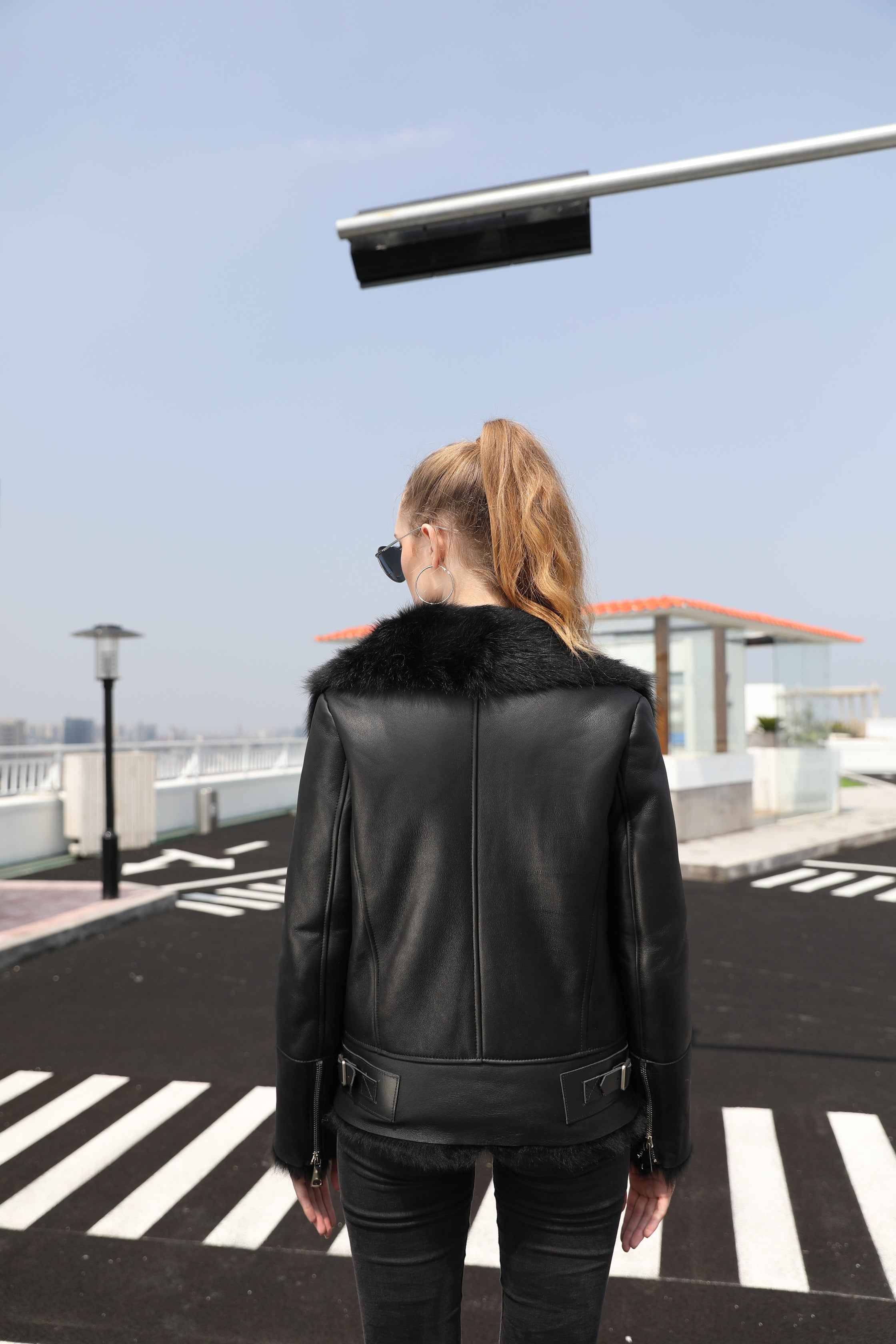 Women's Shearling Leather Jacket with Fur-Trimmed Collar & Cuffs, Zippered Cuffs, and Decorative Hem Buckles - Luxe Winter Outerwear