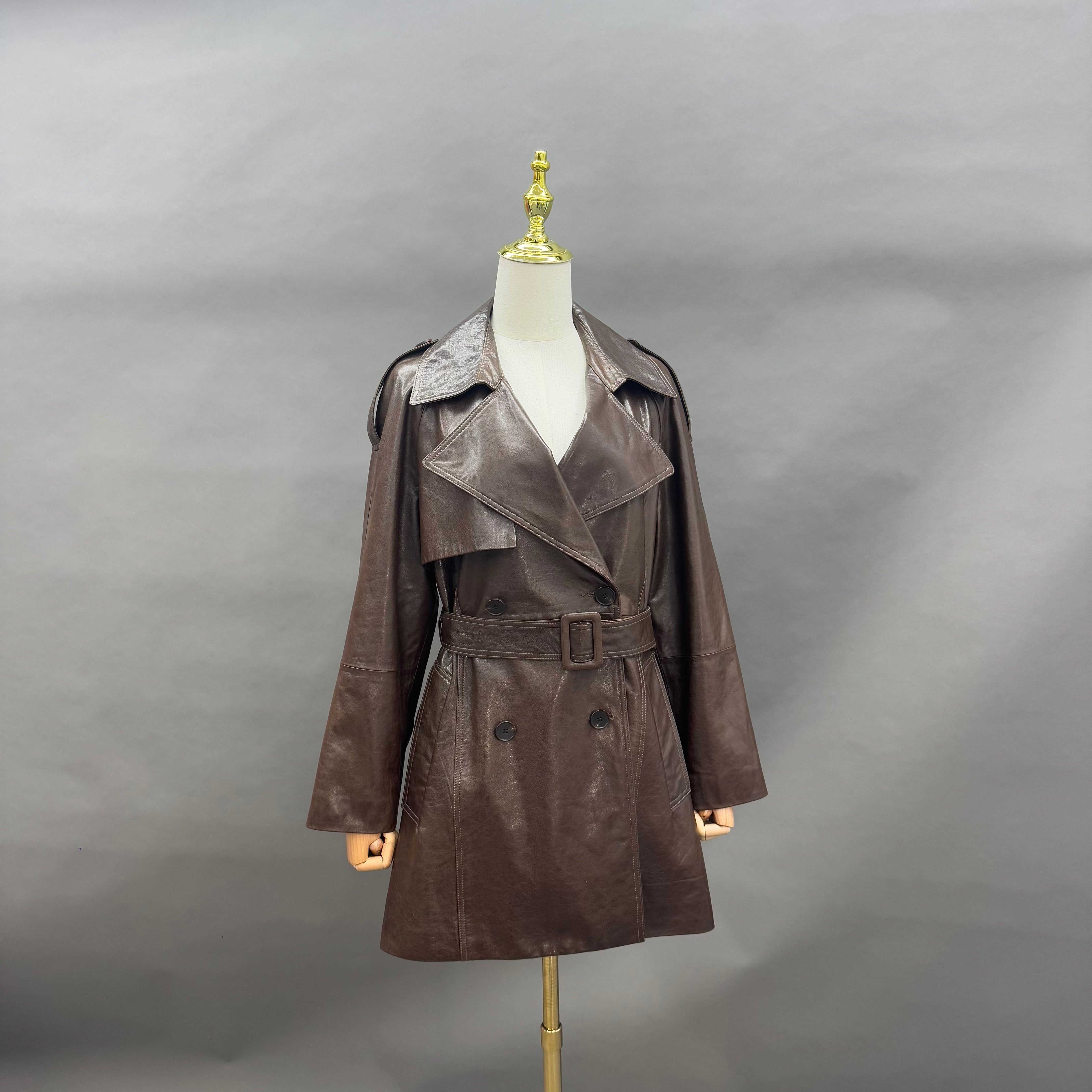 Women’s Brown Leather Trench Coat with Double-Breasted Lapel and Belted Waist – Classic Mid-Length Outerwear for Winter Fashion Brown