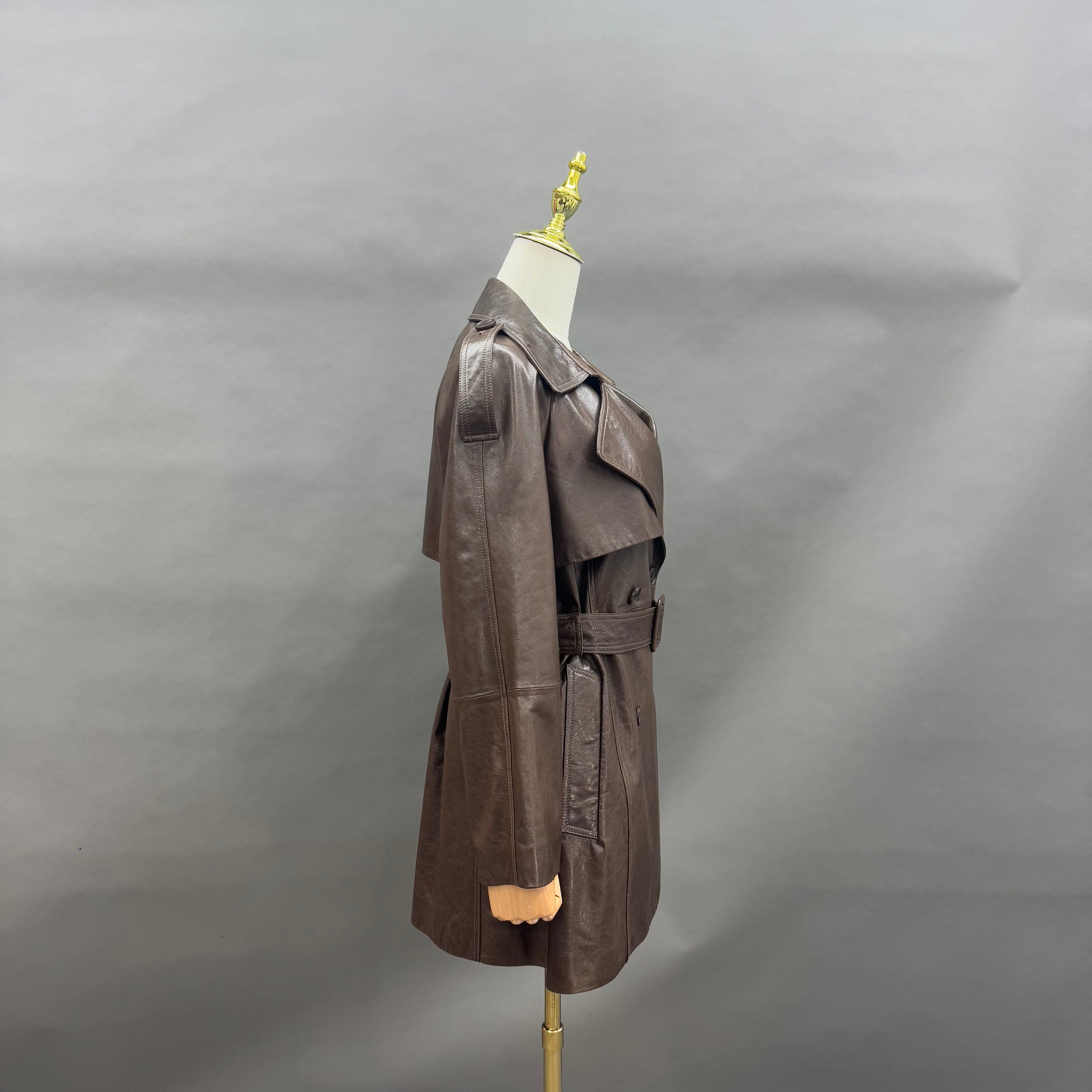 Women’s Brown Leather Trench Coat with Double-Breasted Lapel and Belted Waist – Classic Mid-Length Outerwear for Winter Fashion