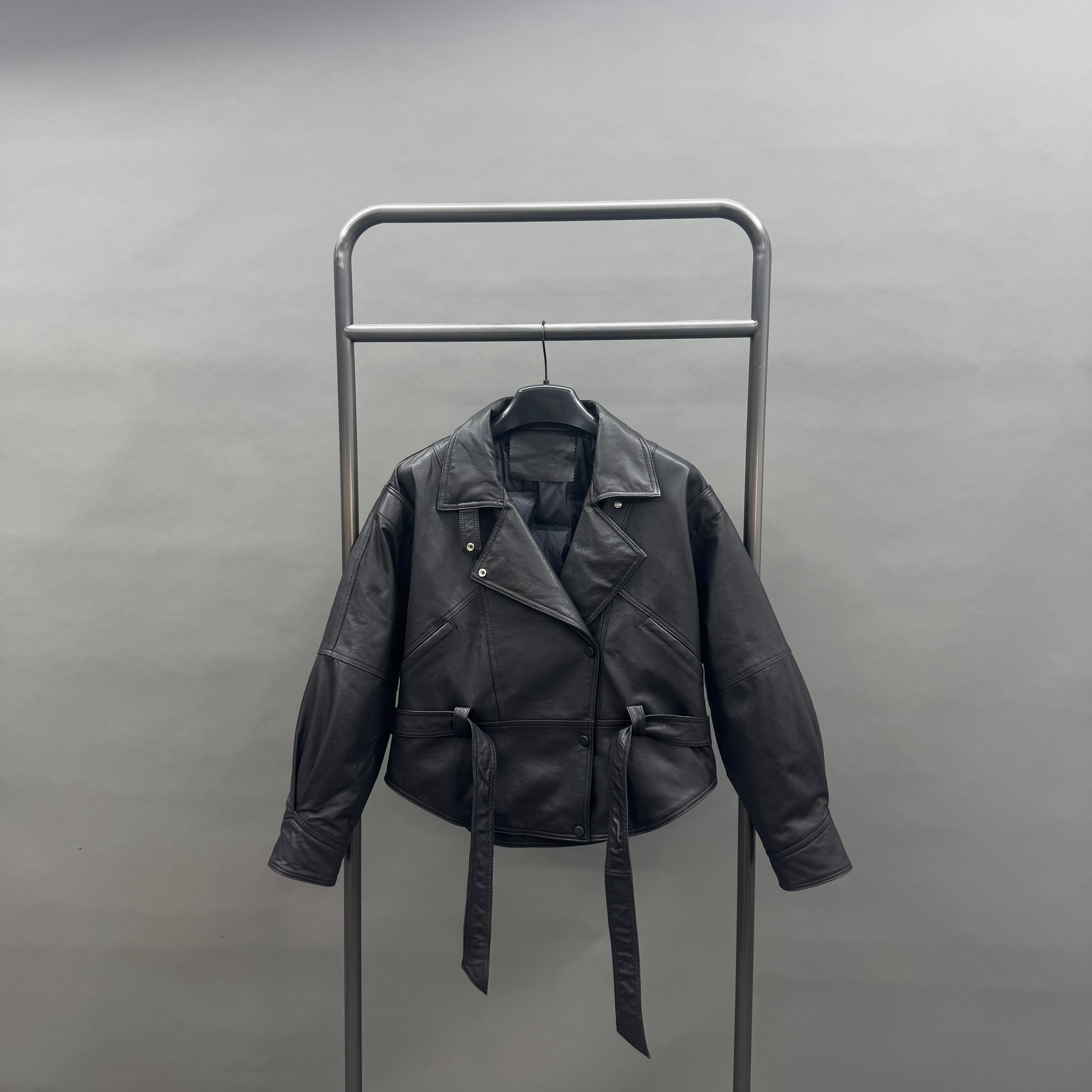 Women’s Black Belted Leather Biker Jacket – Asymmetrical Lapel Short Coat with Waist Tie for Fashionable Winter Wear Black